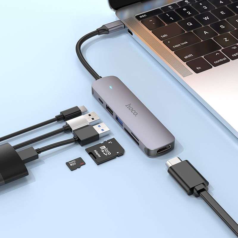 SPOTT-GR Hoco HB28 - USB Hub με Καλώδιο Type-C και Υποδοχές 1x USB-A 3.0, 1x USB 2.0, 1x Type-C, 1x SD/MicroSD και 1x HDMI σε Γκρι Χρώμα